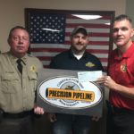 Precision Pipeline Donation : Cpt. Pennock (left) Sheriff Petty (right) Cody Roundcount (Precision Rep), (Center)